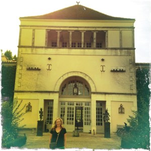 Christina at the front entrance of Les Sources de Caudalie.